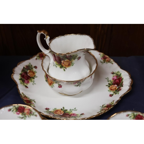 17 - Royal Albert Old Country Roses twenty-one piece teaset comprising cups, saucers, plates, jug and bow... 