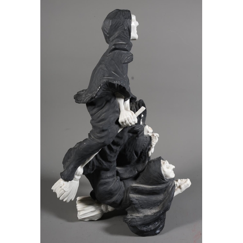 18 - Algora figure group of three witches on broomsticks.