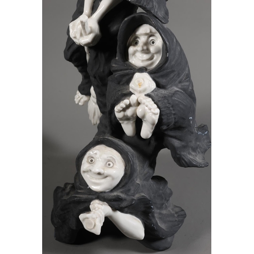 18 - Algora figure group of three witches on broomsticks.