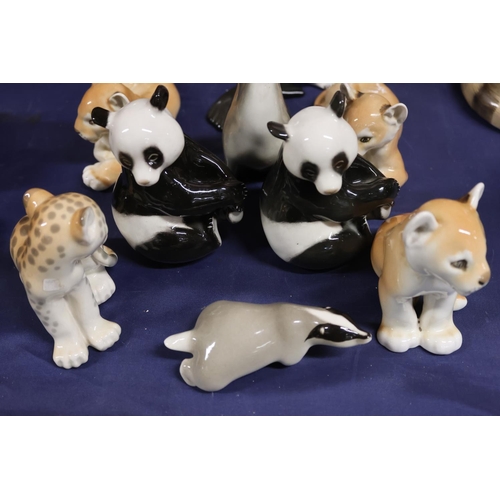26 - Russian figures including pandas, penguins, leopards, badgers.&nbsp; (10)
