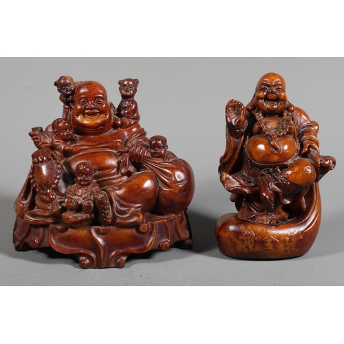 32 - Pair of resin Buddha models.