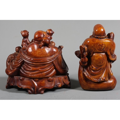 32 - Pair of resin Buddha models.