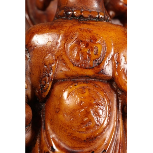 32 - Pair of resin Buddha models.