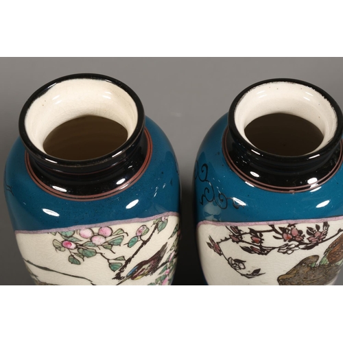 35 - Pair of Japanese style  miniature vases, green ground with lozenge panels depicting birds, 10cm high... 