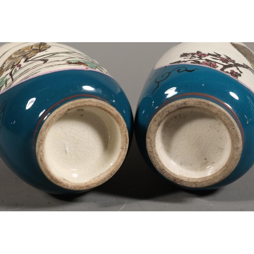 35 - Pair of Japanese style  miniature vases, green ground with lozenge panels depicting birds, 10cm high... 