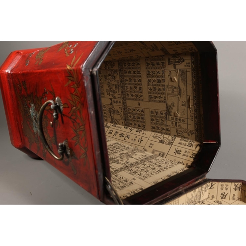 38 - Japanese style box with faux red lacquer, elaborate foliate and avian decoration, hinged lid, loop h... 