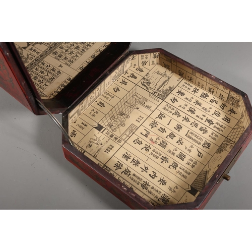 38 - Japanese style box with faux red lacquer, elaborate foliate and avian decoration, hinged lid, loop h... 