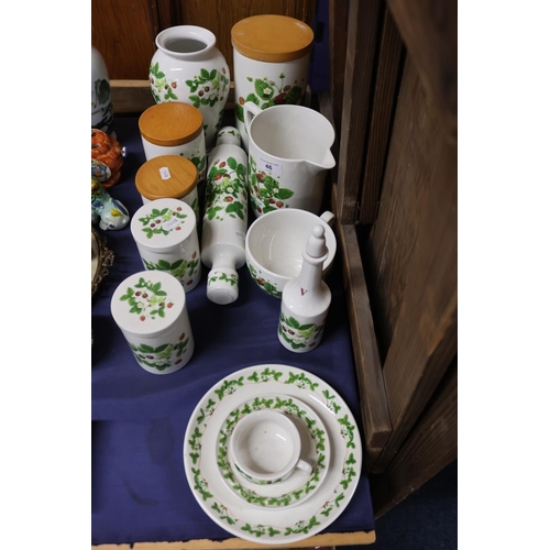 46 - Portmeirion Summer Strawberries comprising jars, vases, a rolling pin, etc.