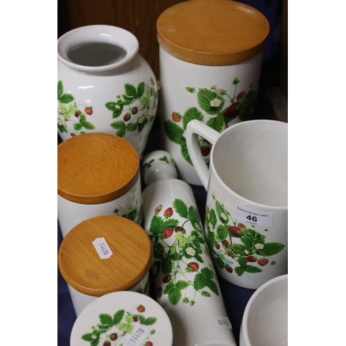 46 - Portmeirion Summer Strawberries comprising jars, vases, a rolling pin, etc.