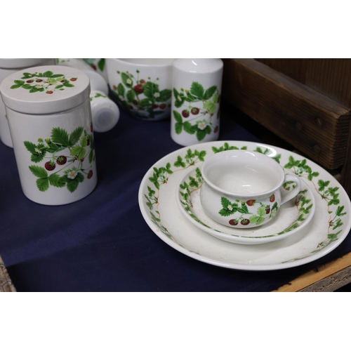 46 - Portmeirion Summer Strawberries comprising jars, vases, a rolling pin, etc.