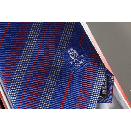 54 - Three J Garcia Anniversary Collection ties and a Beijing 2008 tie.