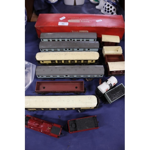 55 - Triang Hornby model railway track, carriages, and a locomotive.