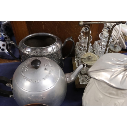 57 - Ceramics including teapots, a money box, plates and a condiment set.