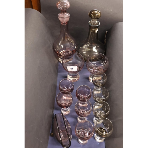58 - Smoked glass decanters and glasses.