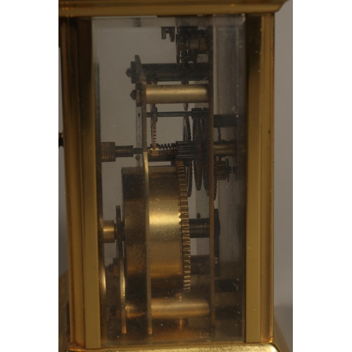 7 - Bayard 8-day clock, 9 jewels movement, with white face, Roman numerals, on bracket feet.