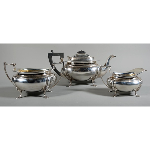 King George V silver three piece tea set by James Deakin & Sons