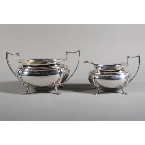 King George V silver three piece tea set by James Deakin & Sons