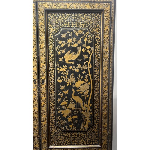 518 - Japanese lacquered cabinet on stand, rectangular top over door enclosing cupboard and drawers, raise... 