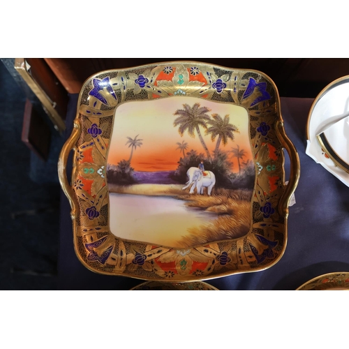 463 - Noritake of Japan, a thirty-eight piece bone china tea set decorated with Indian scenes depicting an... 