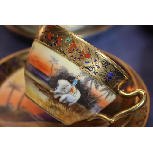 463 - Noritake of Japan, a thirty-eight piece bone china tea set decorated with Indian scenes depicting an... 