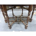 Antique oak double gate leg dining table with plank top.
