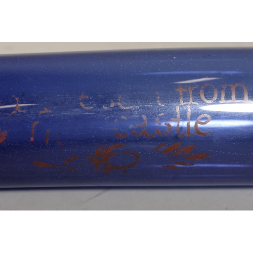 Blue glass rolling pin with faded poppy decoration, inscription from ...