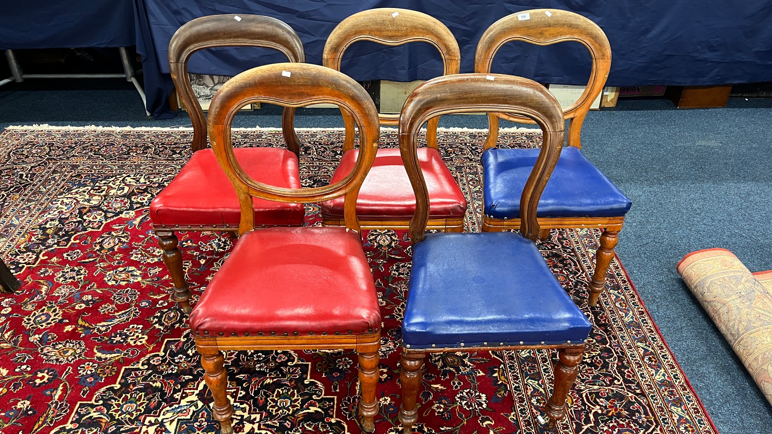 Harlequin set of five Victorian mahogany balloon back dining chairs. (5)