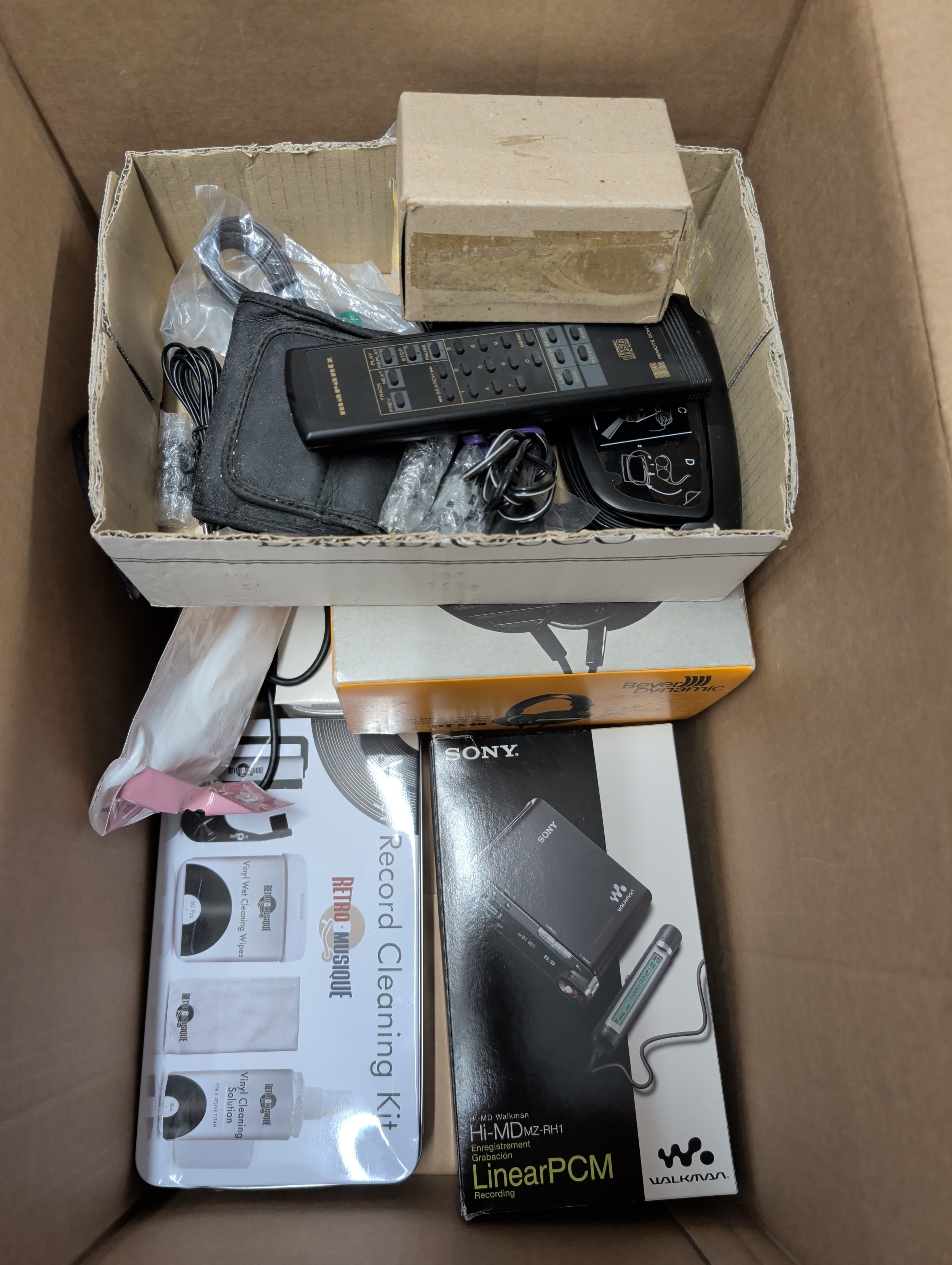 Box containing Beyer Dynamic headphones, Sony walkman, etc.