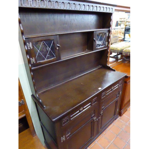 517 - Priory style dark oak lead glazed dresser