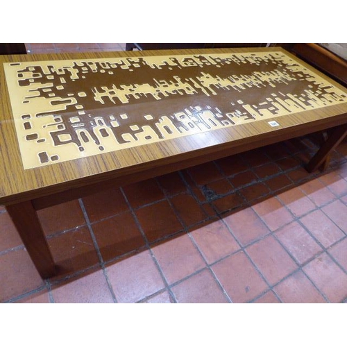 524 - 1970's Teak effect abstract tile top coffee table