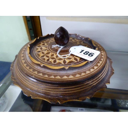 186 - Circular carved wooden trinket box