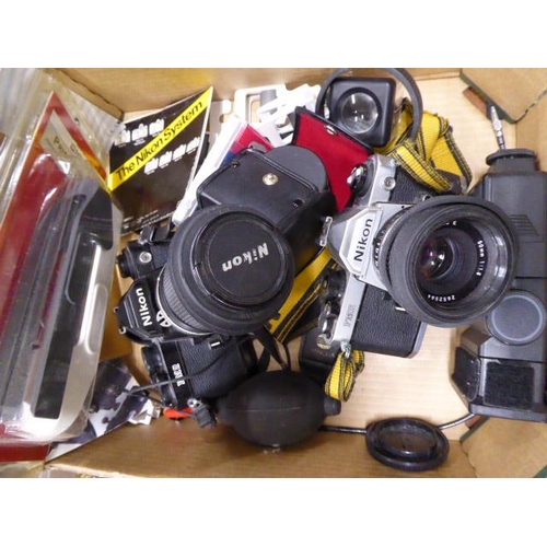 215 - Nikon FM2 SLR cameras, flash unit, video converter lens etc