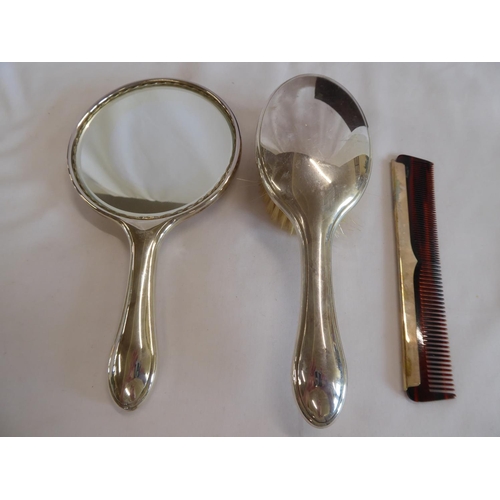 34 - Cased silver dressing table brush and mirror set - Carrs of Sheffield 2009