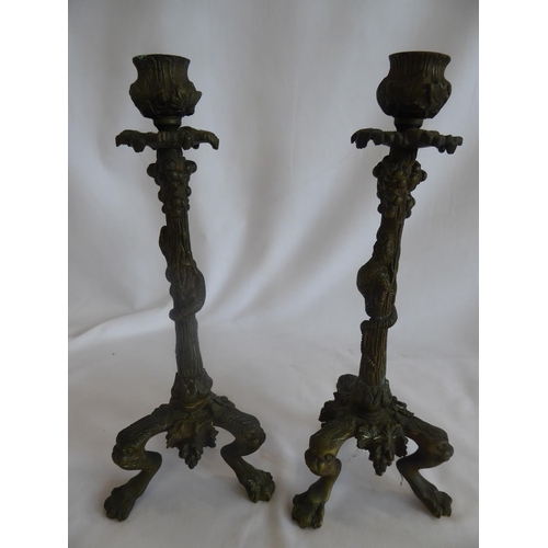 62 - Pair 19th/20thC bronze tripod candlesticks in the form of a salamander climbing to grapes, on lion p... 