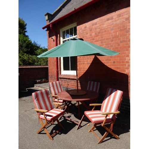 3 - Circular teak garden table, 4 chairs and parasol