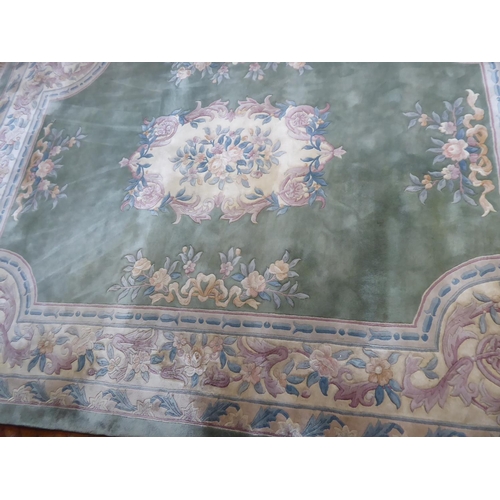 525 - Pale green ground Chinese woollen carpet ( 152