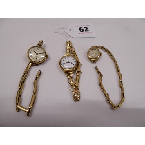 62 - 9ct gold cased ladies watches on rolled or plated straps (3)