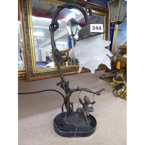Nouveau style brass table lamp - cherub on a swing on marble base