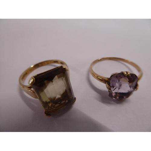 21 - 9ct gold smoke quartz and amethyst rings (2)