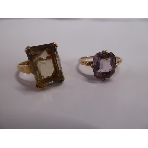 21 - 9ct gold smoke quartz and amethyst rings (2)