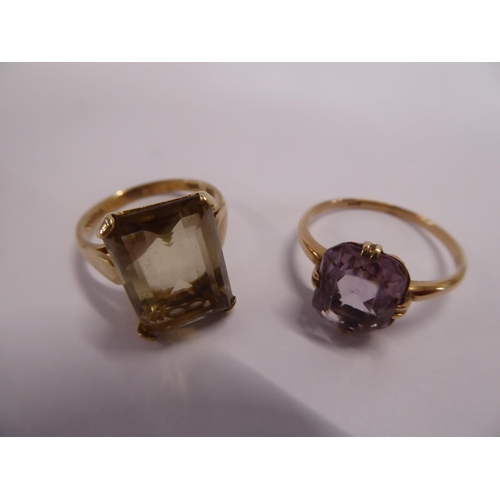 21 - 9ct gold smoke quartz and amethyst rings (2)