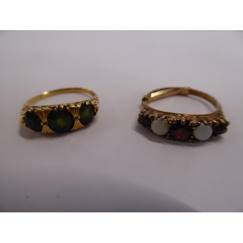 22 - 9ct gold ruby and opal, 9ct gold emerald rings (2)