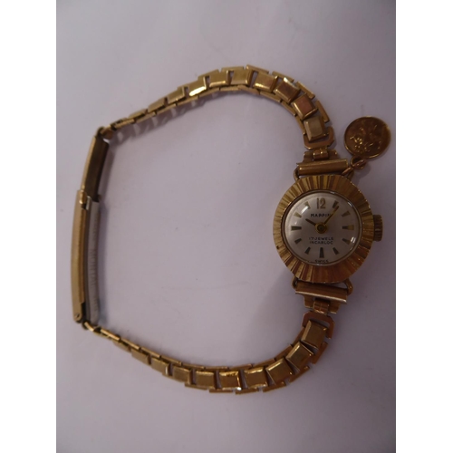 35 - 9ct gold Mappin ladies wristwatch with 9ct gold St Christopher charm on rolled gold strap