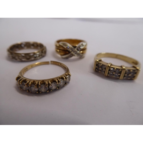 39 - 9ct gold rings with cubic zirconium stones A/F and gold and silver band (4) (12g)