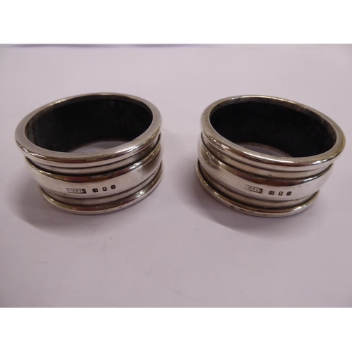 49 - Cased pair Britannia silver napkin rings BMC Ltd London 1928