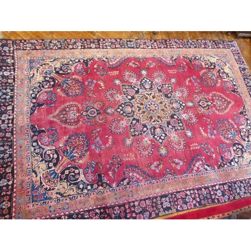 585 - Persian Mashad red and blue ground floral pattern rug (102