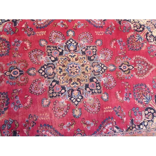 585 - Persian Mashad red and blue ground floral pattern rug (102