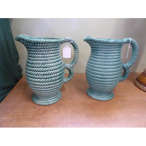 172 - Pair mid 20thC Govancroft? green glaze rope twist jugs (10