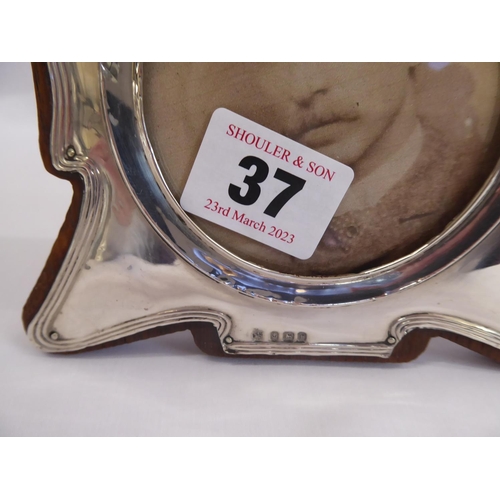 37 - Silver mounted oak photograph frame (B'ham 1905)