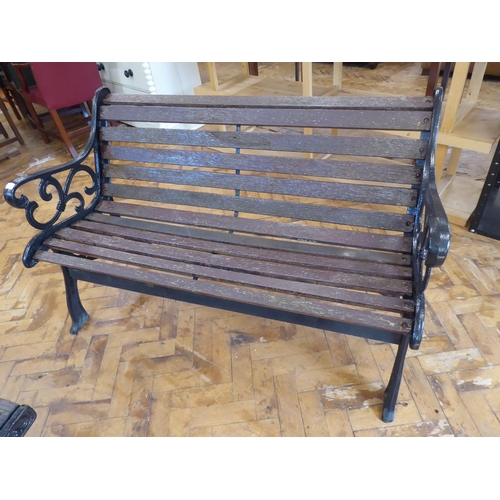 2 - Cast iron wooden slatted table, bench and 2 chairs